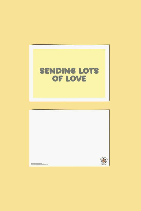 Happy Stack Cookies sending lots of love card showing front and back side on a yellow background.